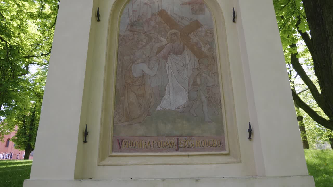 the sixth station of the Way of the Cross, depicting Veronica wiping the face of Jesus, located in Petř&iacute;nsk&eacute; sady on Petř&iacute;n Hill in Prague, Czech Republic