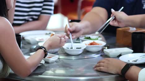 friends sharing food and conversation at a table