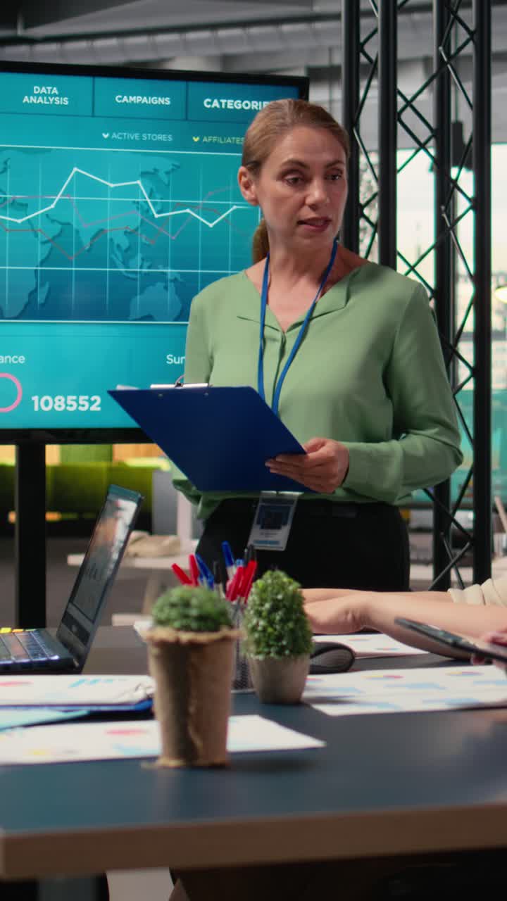 Vertical Video Professional executive manager hosting a meeting to present company objectives