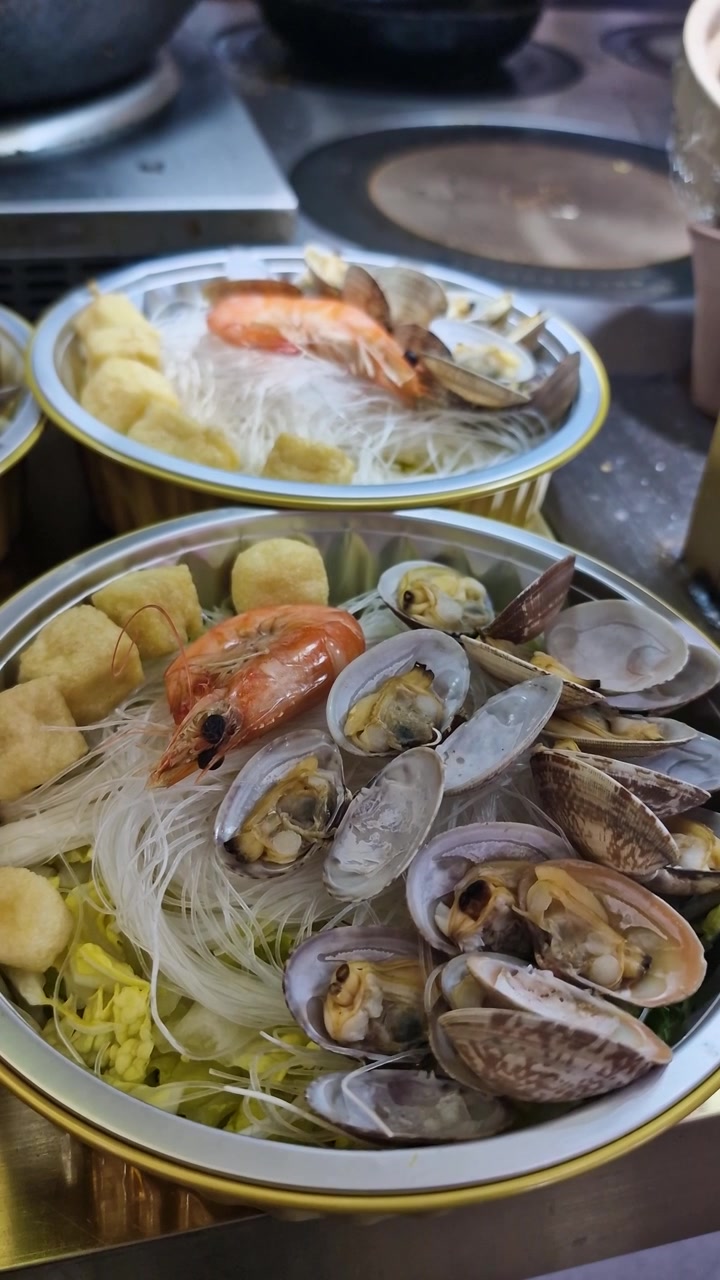 Vertical View of Seashells and Shrimps With Vegetables, Traditional Chinese Street Food Market