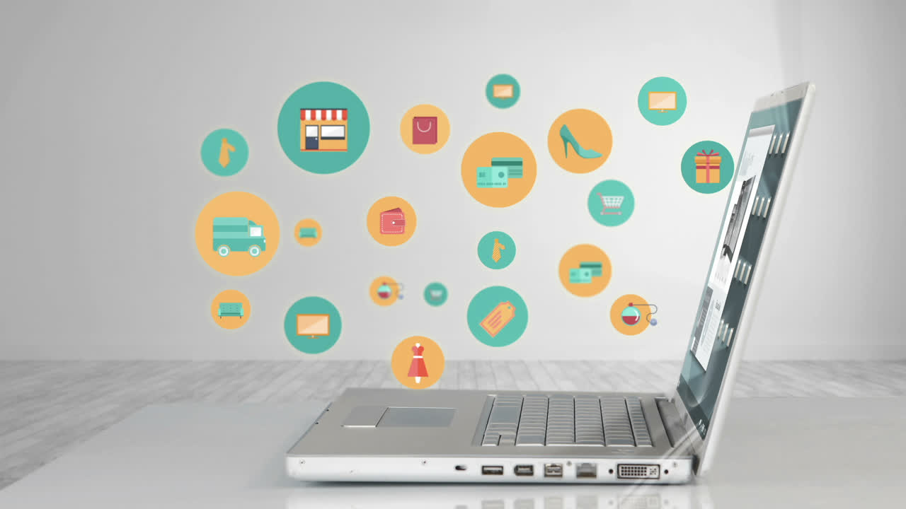 iconos de compras apareciendo por el portátil