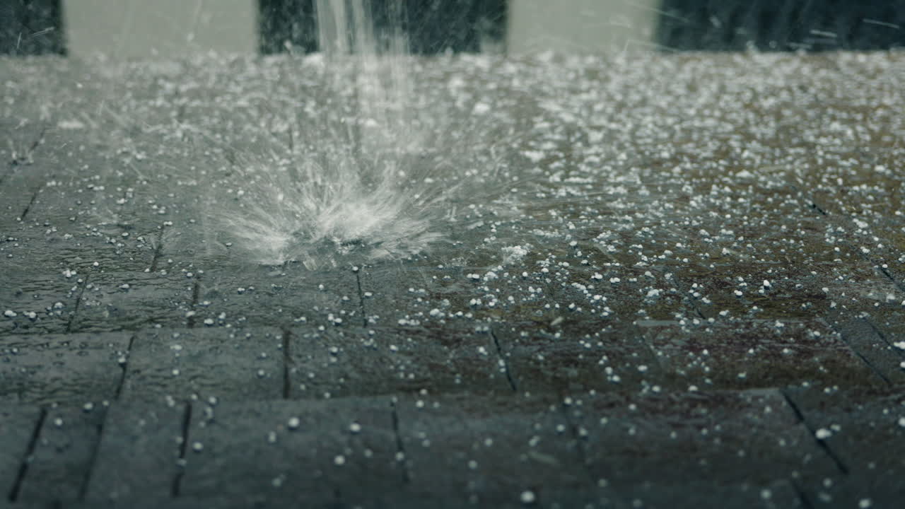 Hail and Rain on a Paved Surface