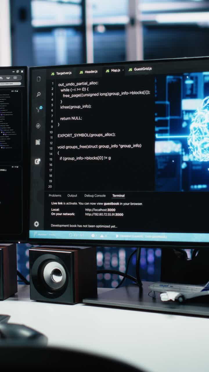 Vertical video Monitors in data center displaying AI tech software interface