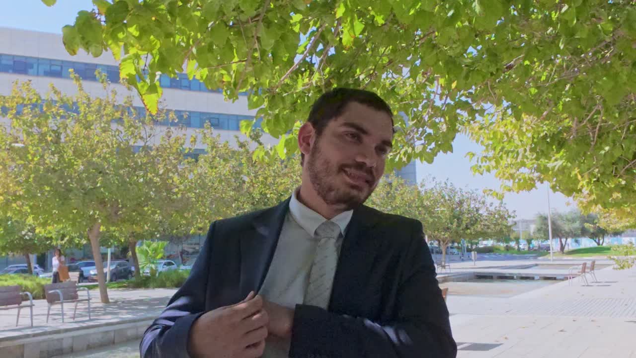 Man in suit standing outside