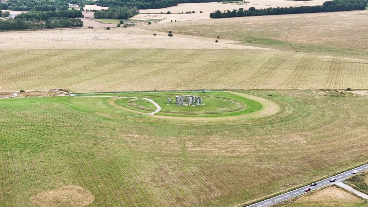 Aerial view of Salisbury Plain panorama with Stonehenge landmark and countryside road