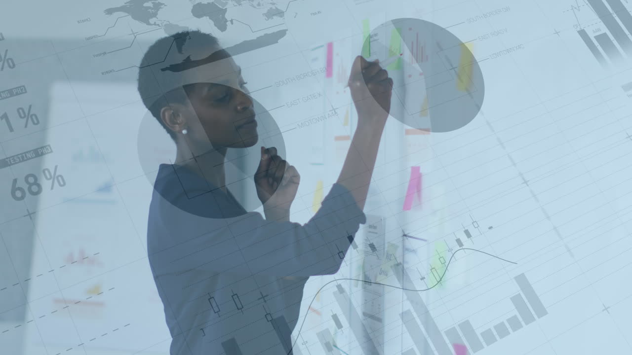 Animation of charts and data processing over african american businesswoman brainstorming