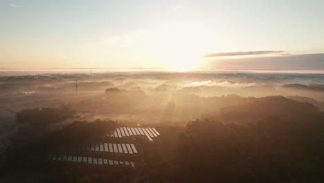 Aerial-drone-fly-above-japan-countryside-Solar-Panel-landscape-aerial-sunset-in-Miyagi-Japan