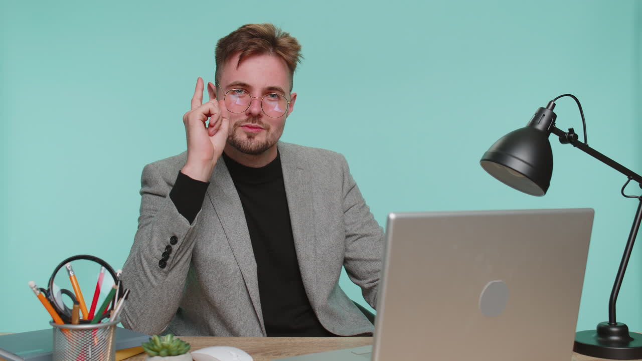 Inspired business man pointing finger up with open mouth having good idea plan inspiration startup