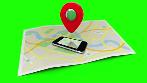 red marker pointing at a mobile lying on a map of a town