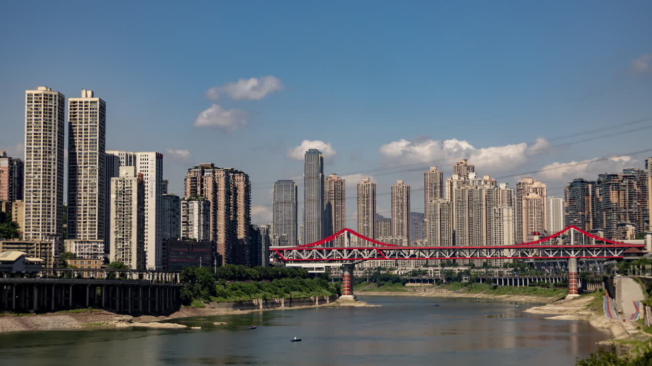 Timelapse of the amazing Chongqing cyberpunk city skyline from a high vantage point wirh the yangtze river