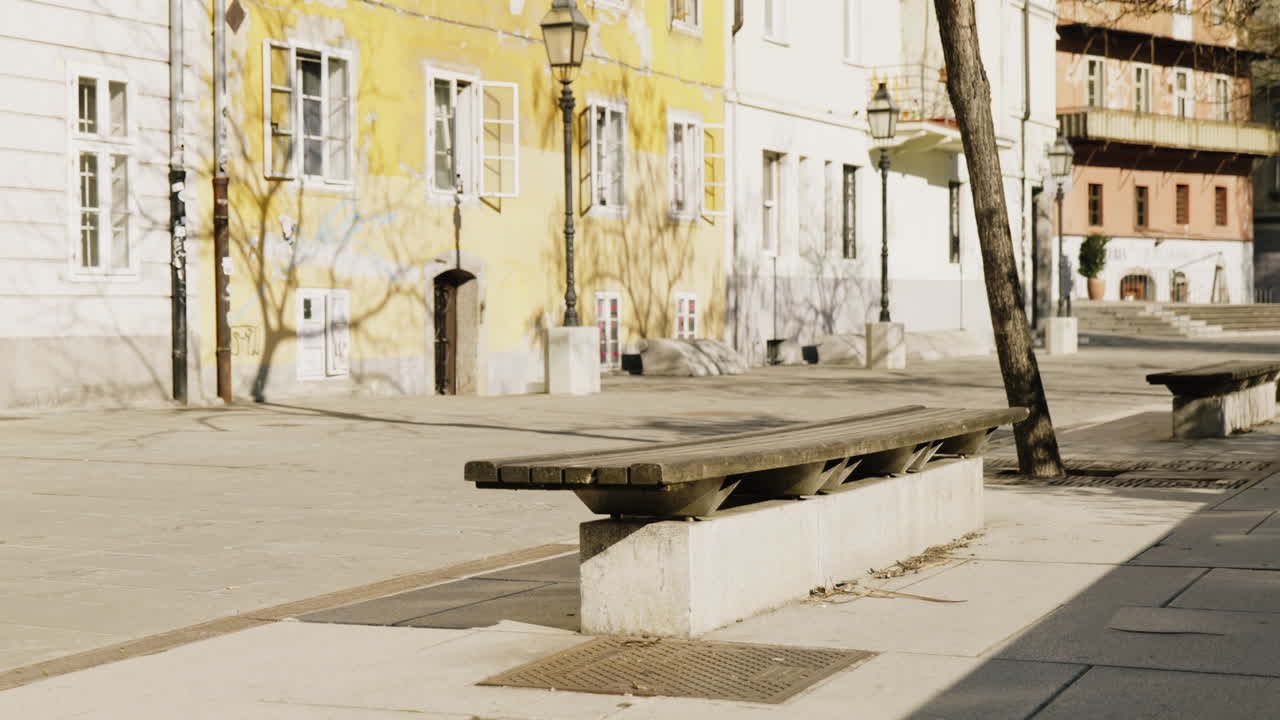 Empty City Street with Park Bench