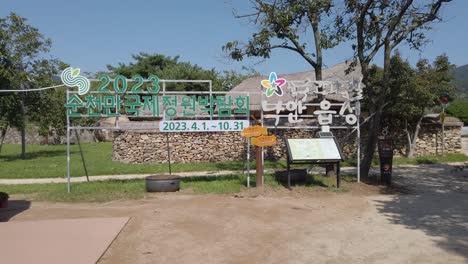 push in towards 2023 event sign in suncheon bay national garden, south korea