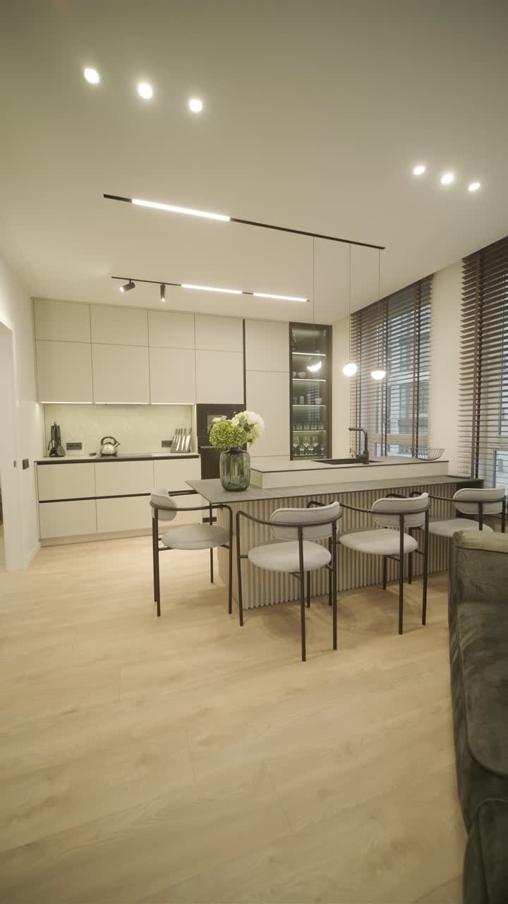 Modern minimalist apartment interior featuring simple decor, neutral tones, and clean lines. The design emphasizes functionality, creating a serene and organized living space.