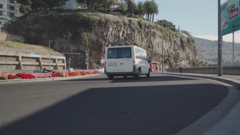 street scene with vehicles and city views