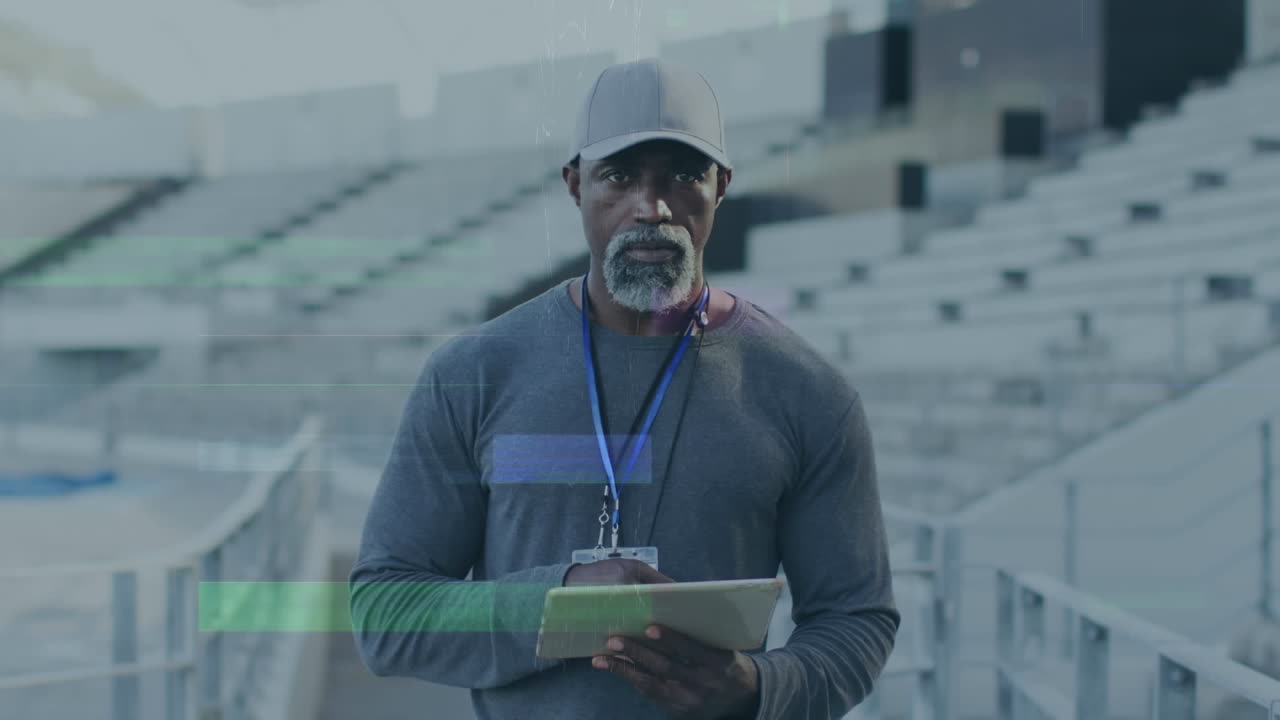 Animation of interference over african american male coach with tablet