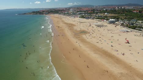 aerial drone video of a beach during summer near lisbon, portugal