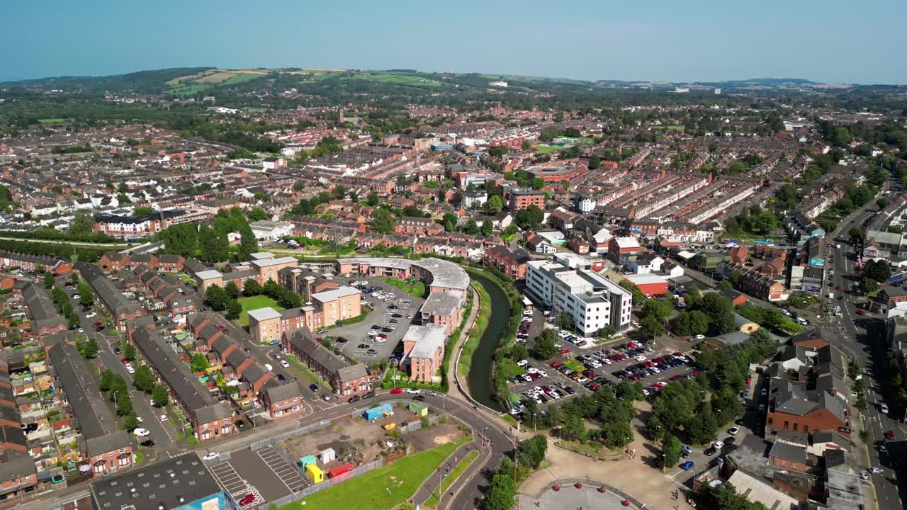 Rising aerial GV of East Belfast, Northern Ireland, UK on a bright and sunny day. Produced in 4K, 60FPS and with Rec709 color
