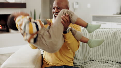 Grandfather,-family-and-child-playing-on-sofa