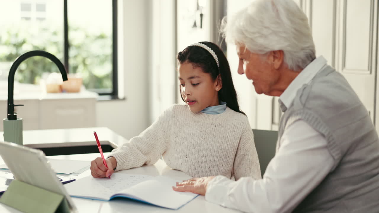 A girl learning from her grandmother
