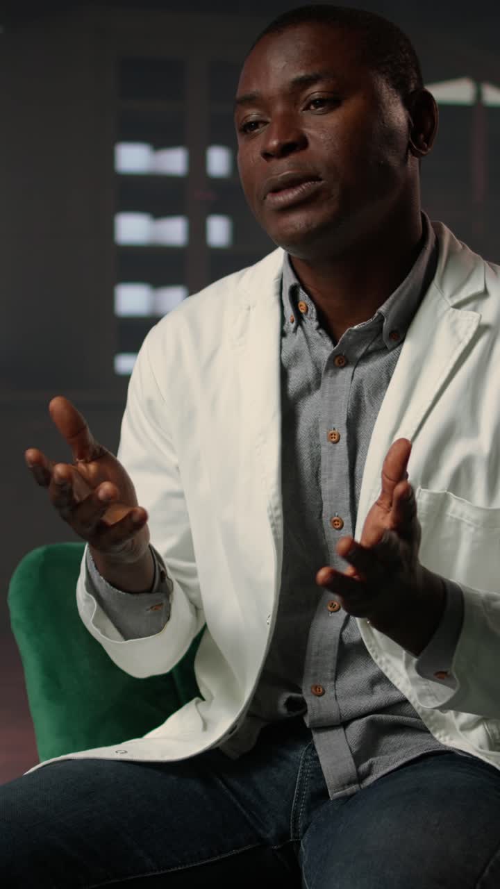 Professional African American Man in White Coat Talking