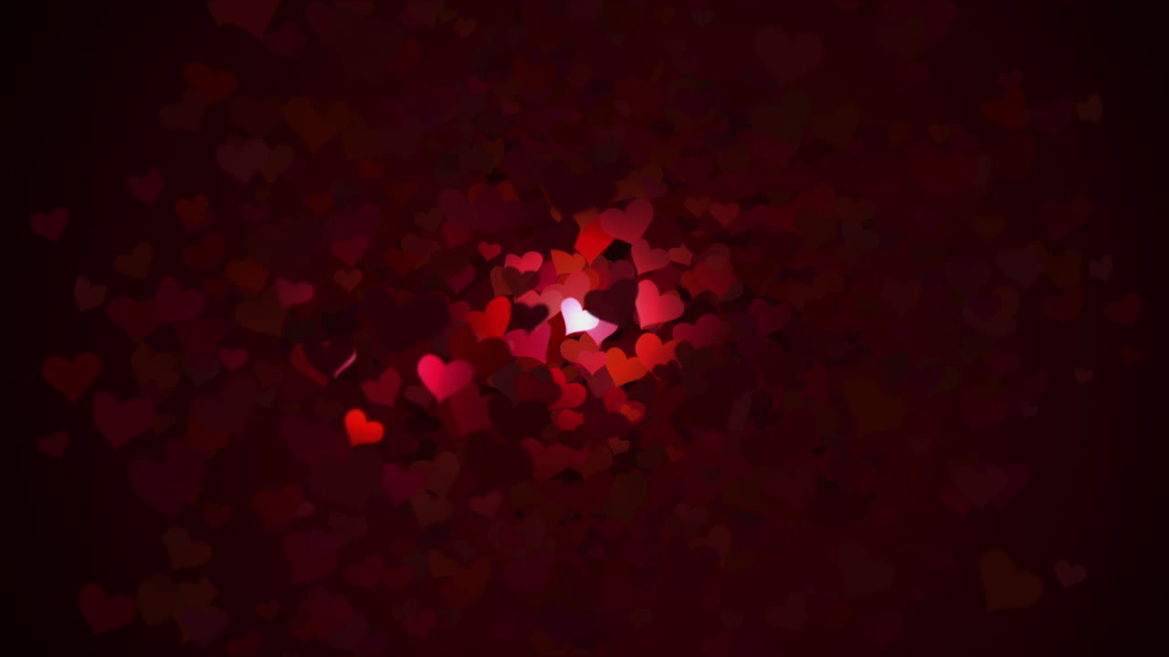 Whirling hearts flying out from the center. Animated red dark romantic background. Night lamp.