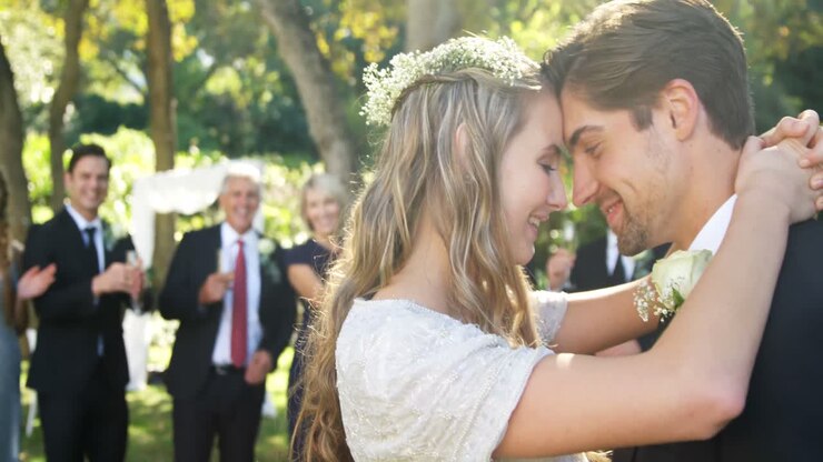 Happy young bride and groom hugging each other 4K 4k