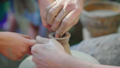 master potter teaches the child his skill the concept is the transmission of experience by generatio