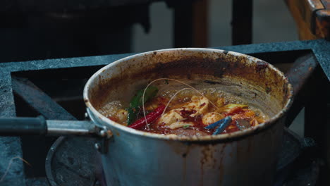 cooking a spicy thai soup