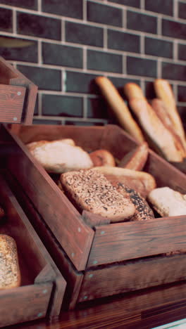 assortment of breads in wooden crate