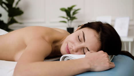 woman relaxing in a massage bed