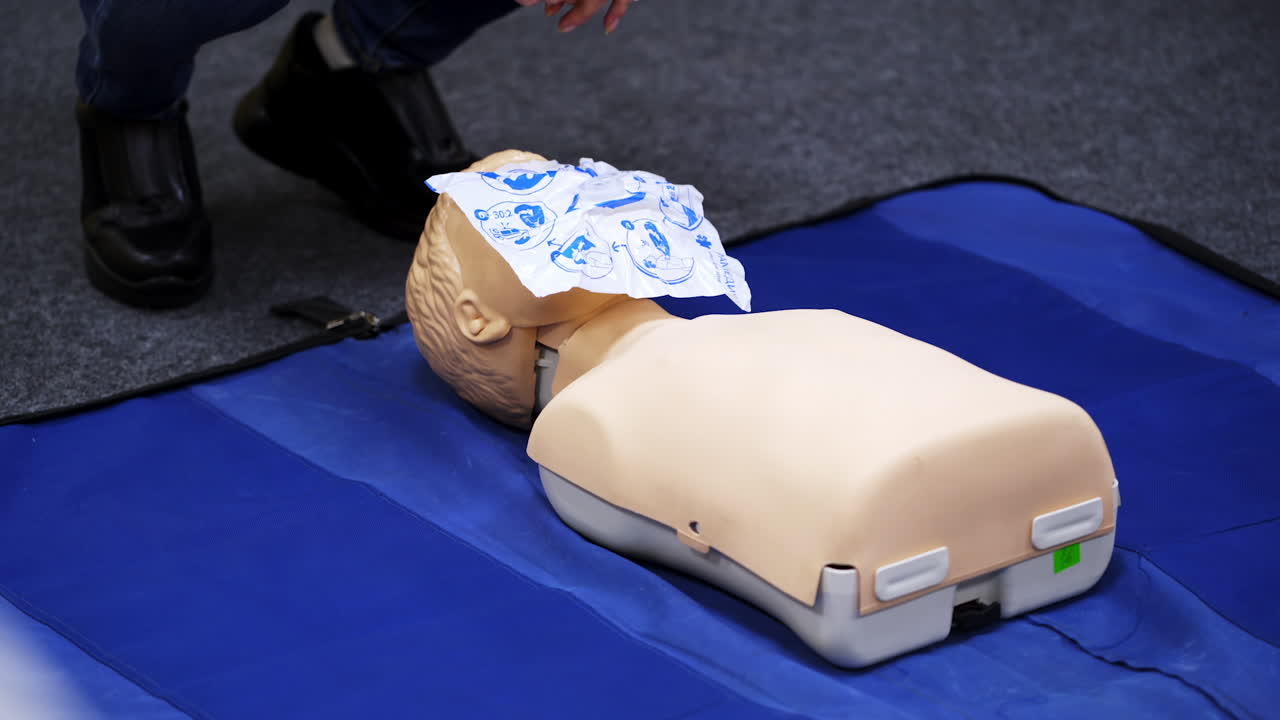 First medical help training equipment. Medical dummy and oxigen mask. Training video.