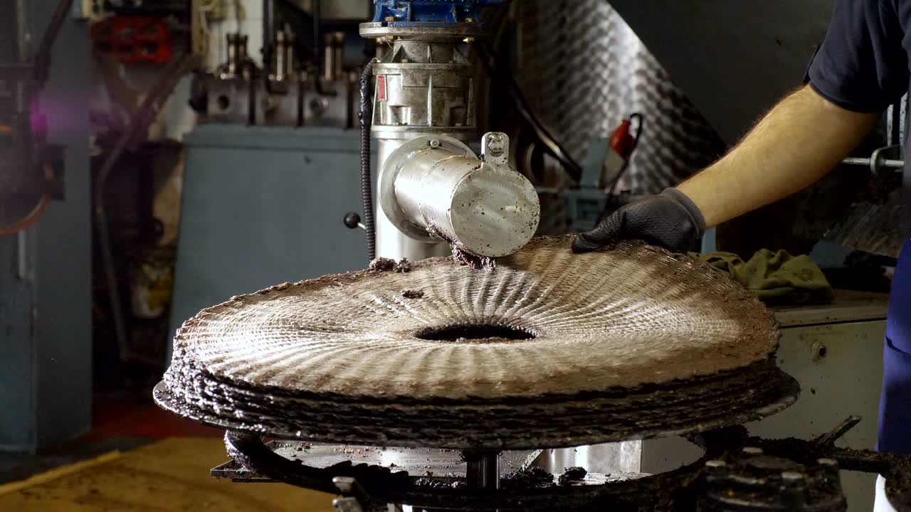 man working in olive oil mill in South of Italy