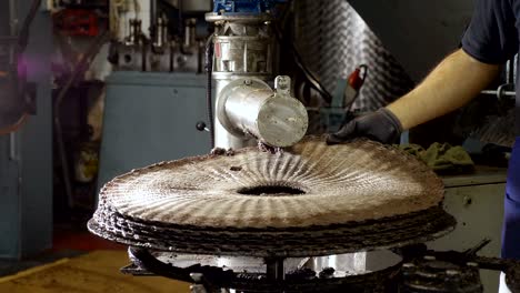 man working in olive oil mill in south of italy