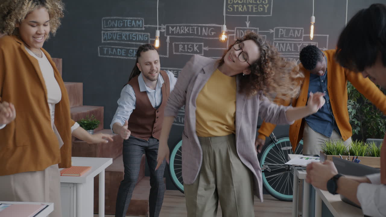 Happy and Energetic Business Team Celebrating