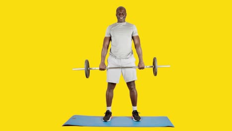 african man squatting with bar with weights