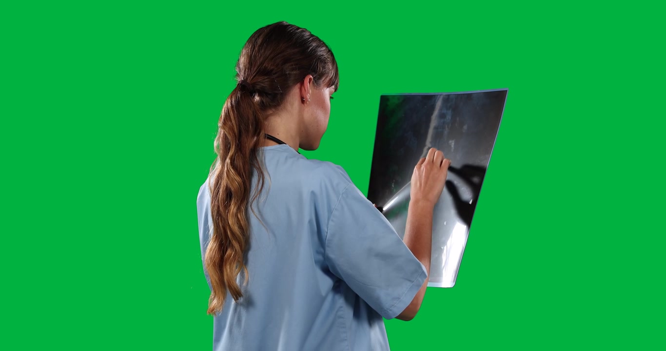 Caucasian medical staff on green background