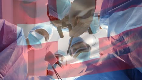 animation of flag of switzerland waving over surgeons in operating theatre