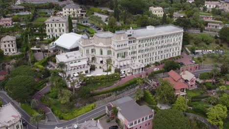 aerial push-in of majestic 5-star imperial palace hotel, santa margherita ligure