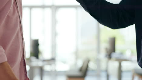 business colleagues fist bumping