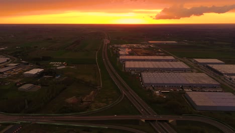 semi-trailers trucks are waiting for the loading and unloading of goods at the warehouse ramps in a large logistics park with a loading hub