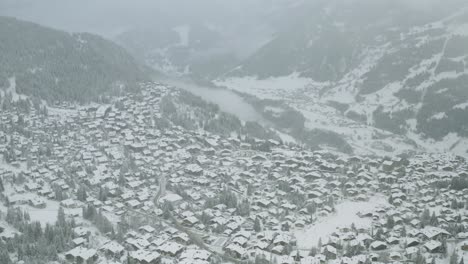 Drone-Aerial-of-the-beautiful-resort-and-spa-town-Verbier-in-the-swiss-alps