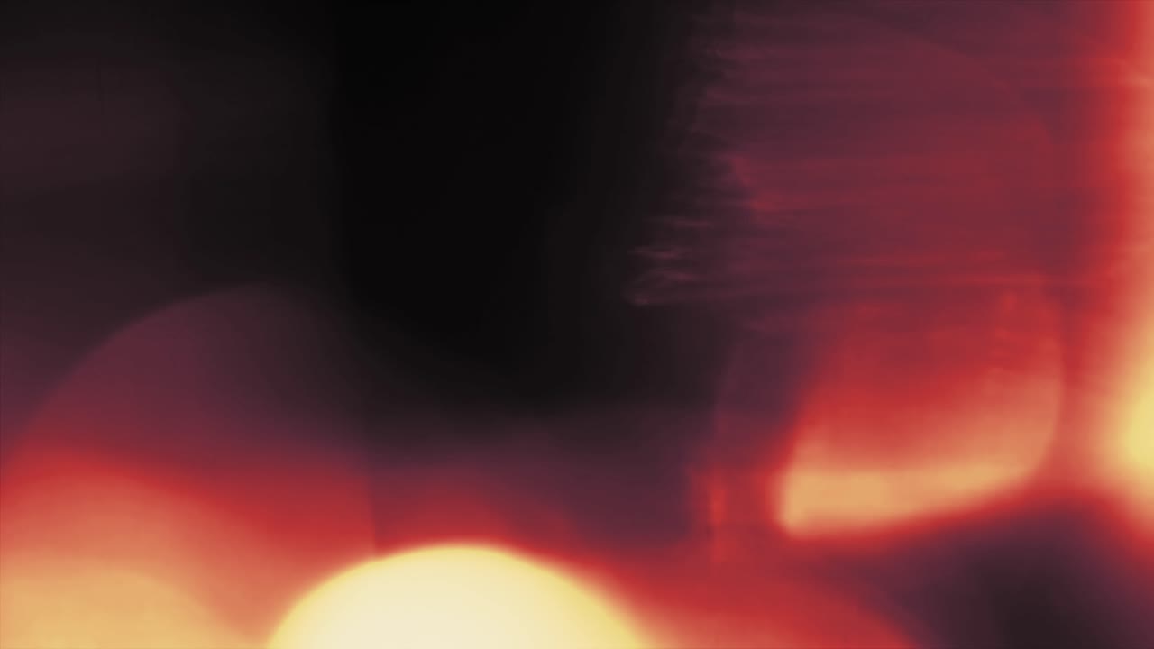 Warm, organic red and yellow light leak with soft, blurry bokeh. Use as overlay for dreamy, romantic, vintage, or fire-themed projects