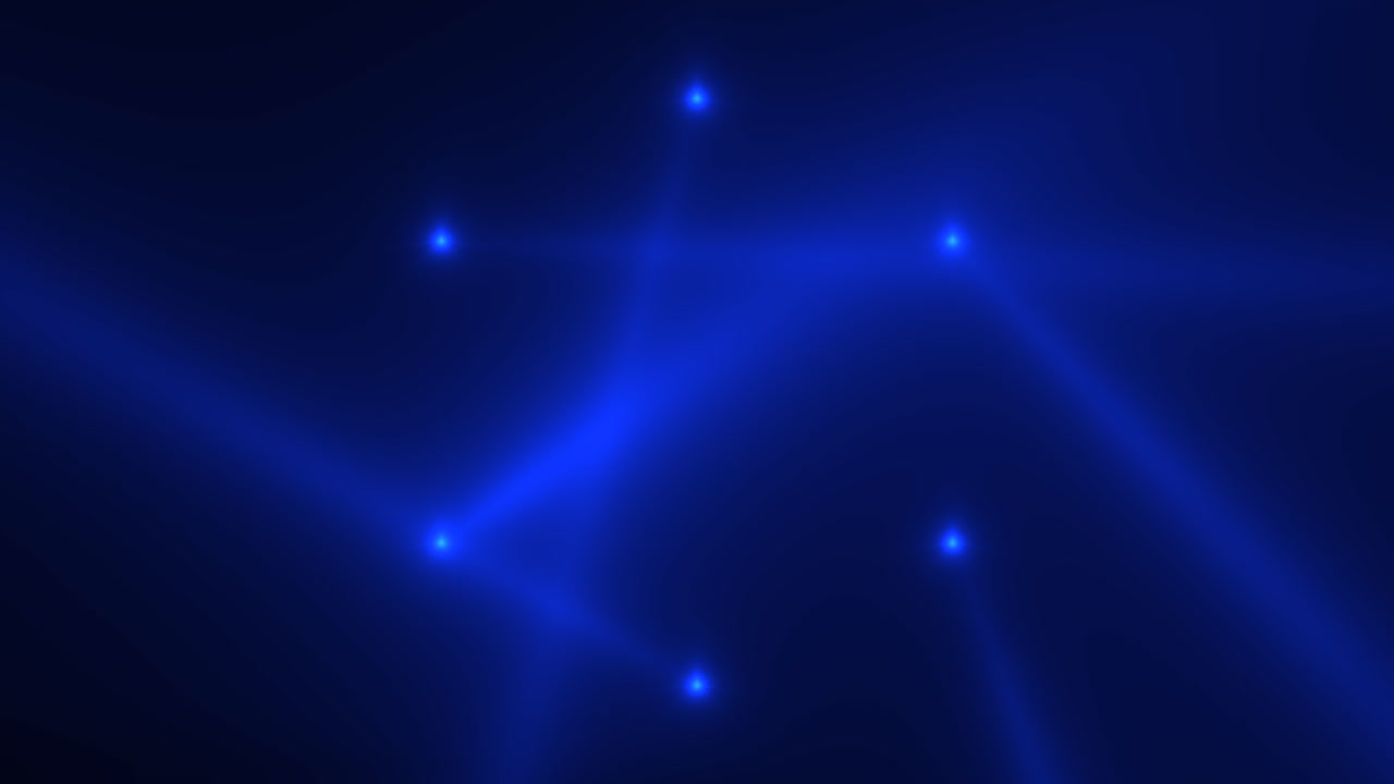 los rayos azules de los reflectores en el escenario de la discoteca