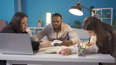 Multiethnic-group-of-friends-studying-at-home.