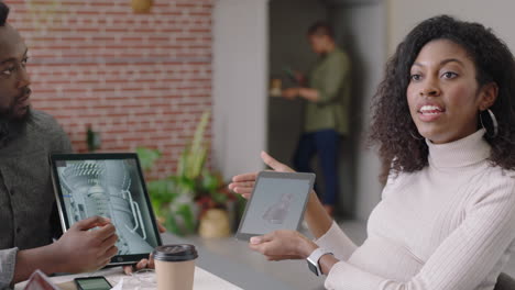 african-american-business-people-brainstorming-engineers-designing-prototype-engine-turbine-using-tablet-computer-3d-technology-creative-team-collaborating-teamwork-sharing-ideas-in-office-meeting