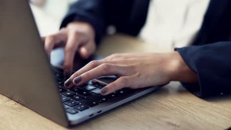 hands, person and typing closeup on laptop