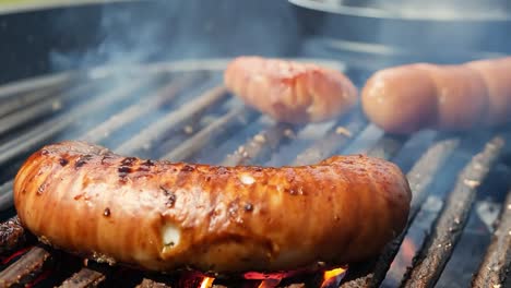 grilled sausages on a bbq grill