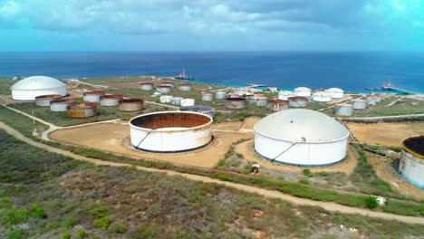 4k-Aerial-of-oil-storage-tanks-and-silos,-Bullenbaai-Oil-Terminal-in-Curacao