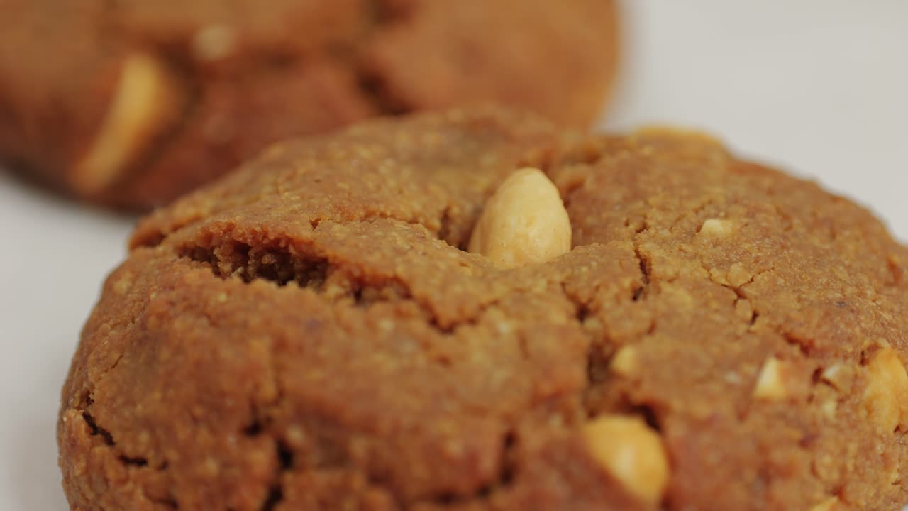 Fresh cookies with almonds in bakery shop close-up. Artisan sweets and bread is making by skill bakers using natural and high-quality ingredients. Food with health and flavour benefits. Sweet breads for dessert and breakfast. Bakery shop and market