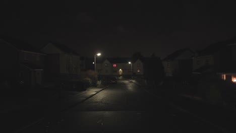 a typical uk town street at night